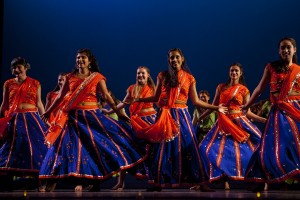 Bates College Bollywood fills the stage with colorful movement during Sangai Asia's presentation of Asia Night. (Sarah Crosby/Bates College)