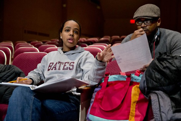 Sankofa co-directors Bethel Kifle '14 of Chicago, Ill., and Jourdan Fanning '14 of Memphis, Tenn., confer during rehearsal in Schaeffer Theatre. (Phyllis Graber Jensen/Bates College)