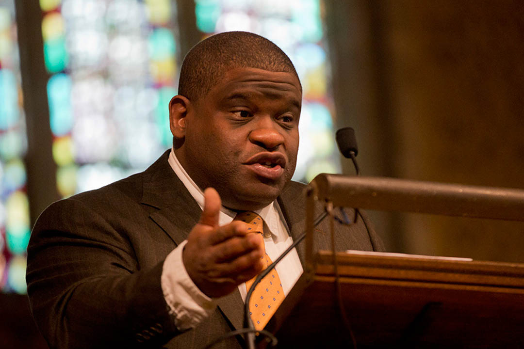 Journalist Gary Younge offers the Martin Luther King Jr. Day keynote address at Bates, an analysis of King's "I Have a Dream" speech, in the Gomes Chapel on Jan. 20. (Phyllis Graber Jensen/Bates College)