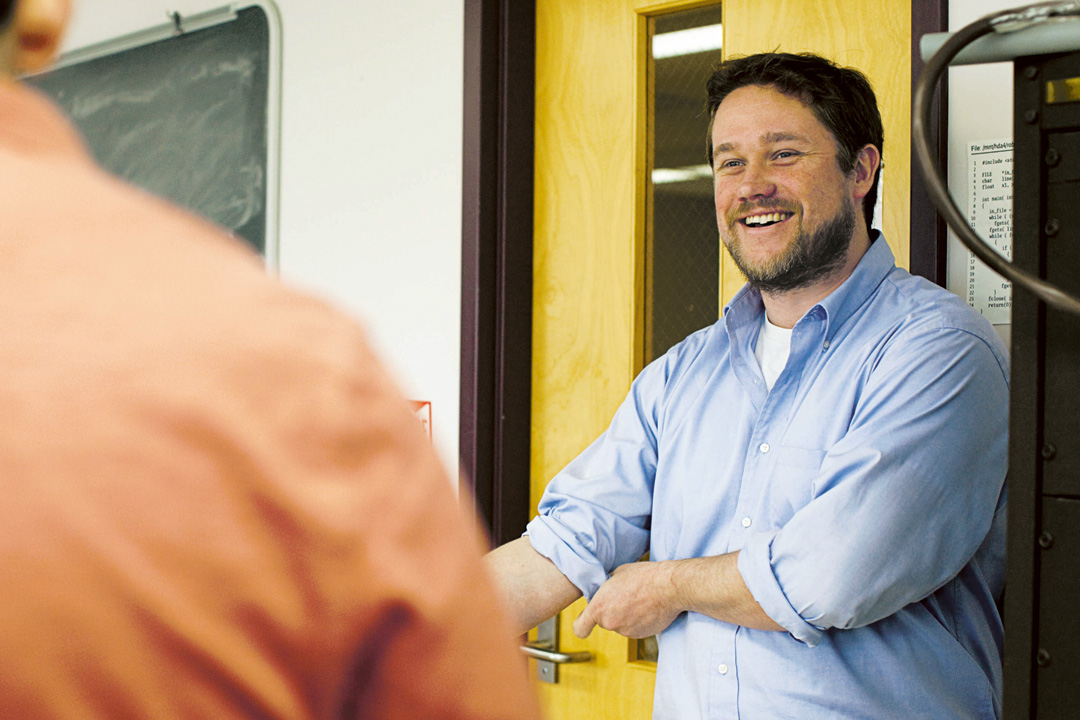 Nathan Lundblad, assistant professor of physics, studies atomic behavior at ultracold temperatures. (Chris Milliman for Bates College)