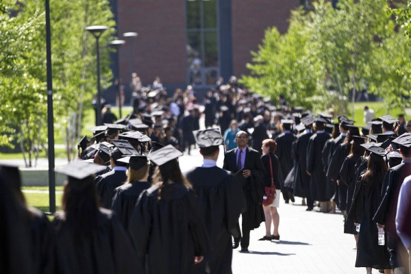 Soon-to-be alumni line up on Alumni Walk just prior to Commencement 2012. (Phyllis Graber Jensen/Bates College)