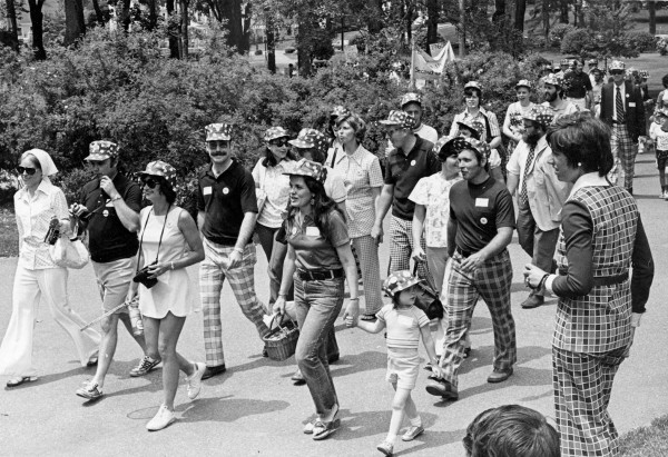 This being from 1974, we’re pretty sure  only the caps are part of the costume,  and not the plaid trousers and pantsuits. Photograph courtesy of the Edmund S. Muskie Archives  and Special Collections Library