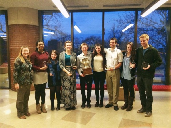 The Bates contingent at the U.S. Universities Debating Championship included (from left) Director of Debate Jan Hovden and debaters Shannon Griffin, Sasha Grodsky, Taylor Blackburn, Jac Stewart, Stephanie Wesson, Matt Summers, Emily Schwalbe and Ben Claeson. (Photograph courtesy of BQDC) 