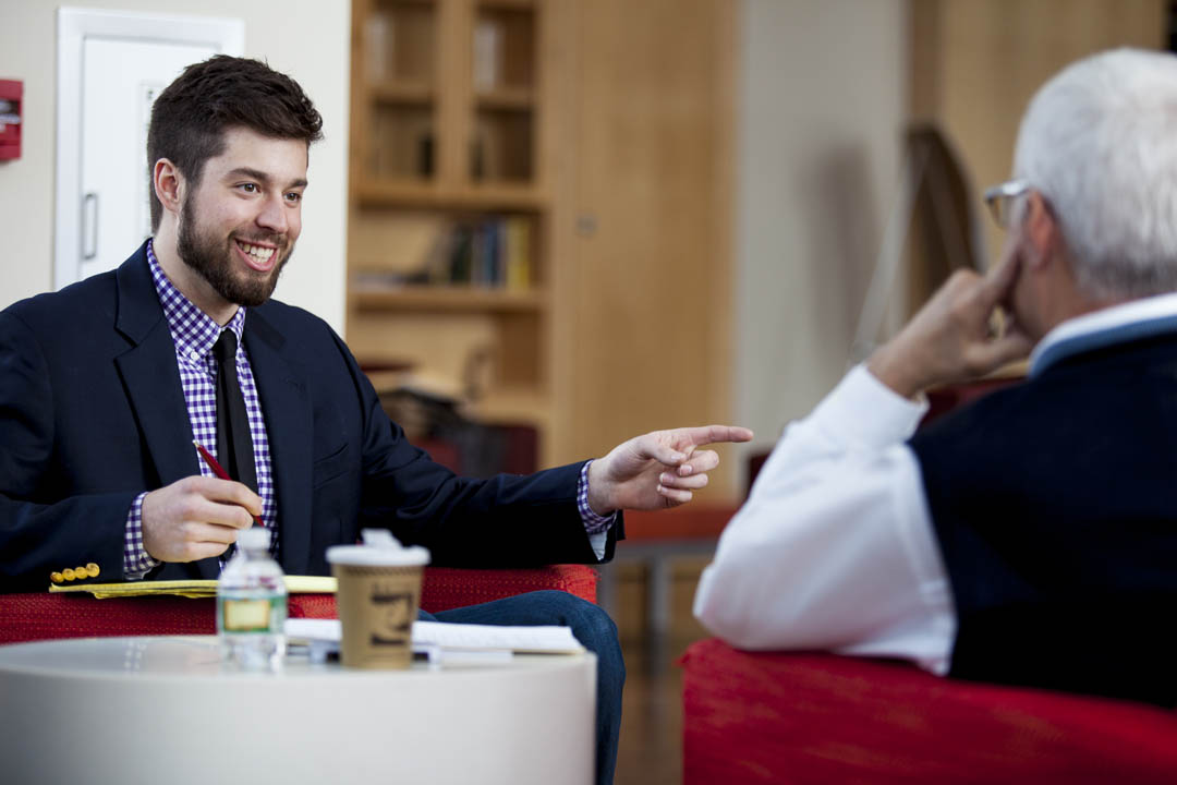 Matt Perejda '14, keynote speaker at the April 4 Bobcat Ventures pitch competition, is shown with Analysis Group co-founder Bruce Stangle '70 in 2014. Stangle visited campus for the Voices in Entrepreneurship program. (Sarah Crosby/Bates College)