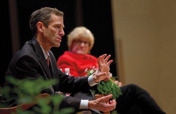 Dean of the Faculty Matt Auer speaks at Parents & Family Weekend as President Spencer looks on. (Phyllis Graber Jensen/Bates College)