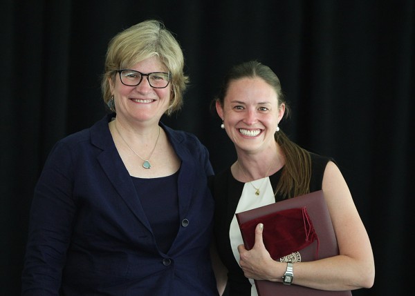Victoria Wyeth '01, right, receives her Bates' Best Award from President Clayton Spencer at the Annual Gathering of the Alumni Association on June 7, 2014. (H. Lincoln Benedict '09)