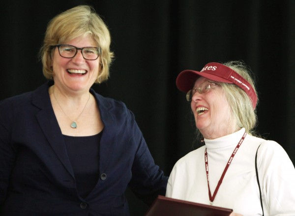 Elizabeth Metz McNab ’64, right, receives her Bates’ Best Award from President Clayton Spencer at the Annual Gathering of the Alumni Association on June 7, 2014. (H. Lincoln Benedict ’09)