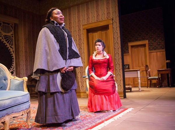 Brittany Davis '14 delivers her soliloquy as the character of Mrs. Givings (Singha Hon '14) listens. (Sarah Crosby/Bates College)