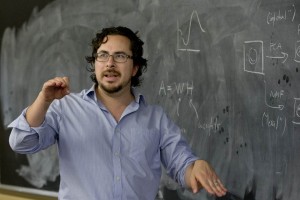 Assistant Professor of Psychology Jason Castro leads his Short Term course. He and his students created a new neuroscience course with a computer-programming emphasis. “Neuroscience grads who can program are recognized as flexible problem-solvers whose core skills readily translate to any specific problem,” Castro says. (Phyllis Graber Jensen/Bates College)