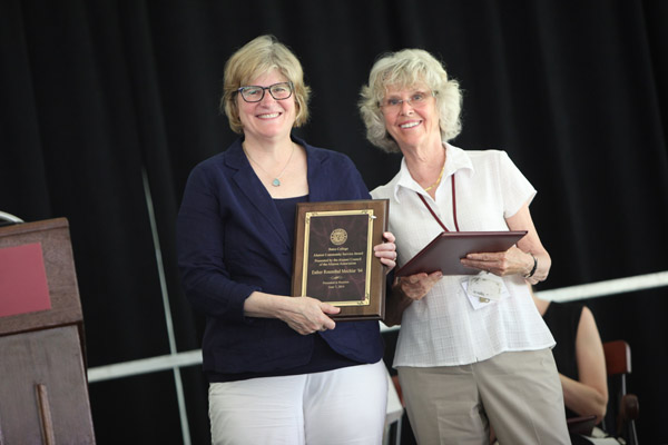 Esther Rosenthal Mechler '64, right, receives the Alumni Community Service Award from President Clayton Spencer at the Annual Gathering of the Alumni Association on June 7, 2014. (H. Lincoln Benedict)