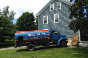 A local oil dealer sent a truck to recover heating fuel from the former Intercultural Education office on July 9. (Doug Hubley/Bates College)