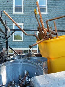 Facility Services plumbers were salvaging still-usable materials from the former Intercultural Education office on July 11. (Doug Hubley/Bates College)