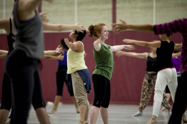 Regan Radulski ‘15 (green top) takes part in a modern-dance class during the Bates Dance Festival. (Sarah Crosby/Bates College)