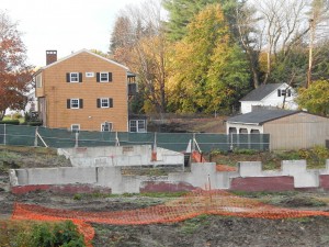 90 Central Ave., the tan house at left, will be demolished in early November for the Campus Life Project. The foundations in the foreground will be removed during the winter. (Doug Hubley/Bates College)
