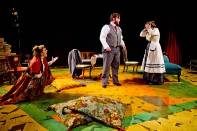 From left, Colette Girardin ’16 of East Moriches, N.Y., Ciaran Walsh ’15 of Washington, D.C., and Hanna Allerton ’15 of New York City perform in the play “The Summer in Gossensass” in Gannett Theater. The production was Allerton's senior thesis project. (Phyllis Graber Jensen/Bates College)