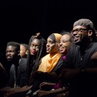 Bates student performers in the organization Sankofa answer questions from the audience following their performance during the evening of Martin Luther King Jr. Day 2014. (Phyllis Graber Jensen/Bates College)