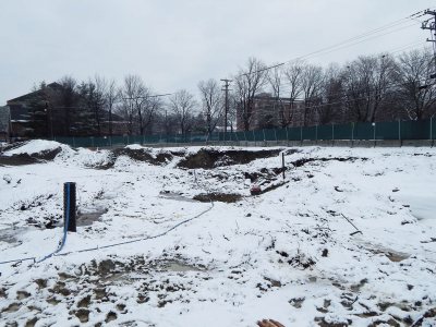 Starting early in 2015, the soil in this section of the 65 Campus Ave. site will be made suitable for building with the implanting of 250-plus "geopiers." Imagine the Michelin Man's leg, writ large. (Doug Hubley/Bates College)