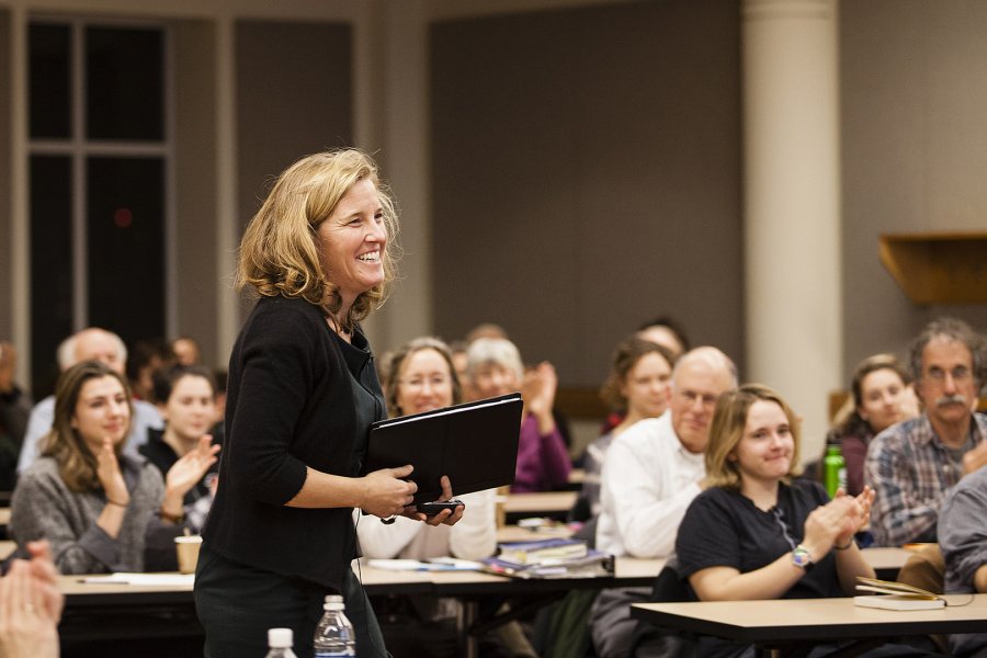 Rebecca Herzig heads to the lectern to deliver a talk celebrating her appointment as the Christian A. Johnson Professor of Interdisciplinary Studies at Bates. (Sarah Crosby/Bates College)