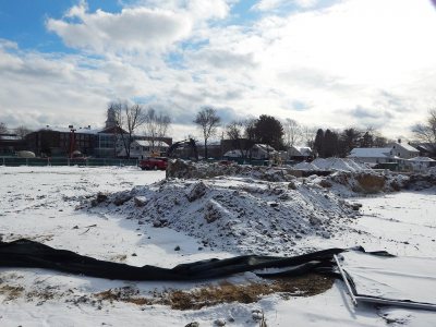 The former site of 53 Campus Ave., which housed the Career Development Center and the Writing Workshop. The area has been graded level since this image was taken on Jan. 9, 2015. (Doug Hubley/Bates College)