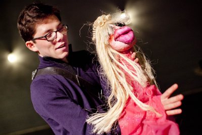 Playing the role of "Sloth, Gluttony and Lechery," Ben Wilentz '16 maneuvers a puppet during a rehearsal for "The Castle of Perseverance." (Phyllis Graber Jensen/Bates College)