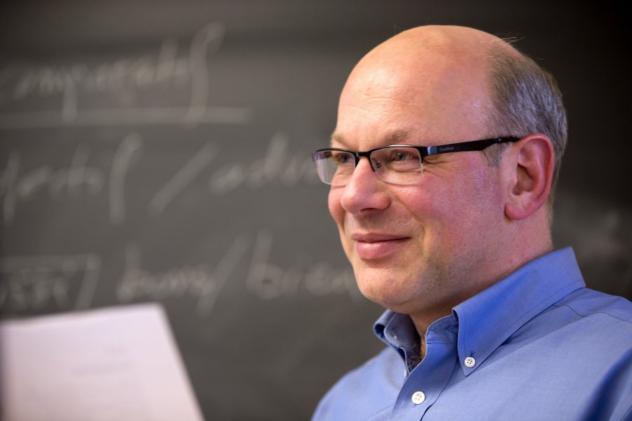 Alexandre Dauge-Roth, associate professor of French and francophone studies, shown during a class. (Phyllis Graber Jensen/Bates College)