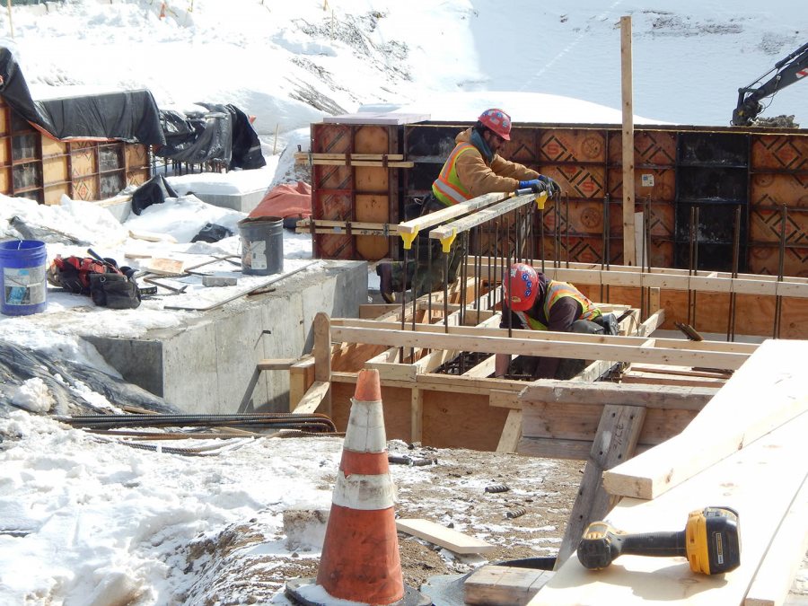 At work on a foundation at 65 Campus Ave. (Doug Hubley/Bates College)