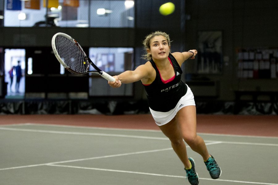 “We have a strong group of girls and very supportive coaches. It’s simply a great feeling to grind it out on the court," says economics major and varsity tennis player Libby Voccola ’17 of Falmouth, Maine. (Phyllis Graber Jensen/Bates College)