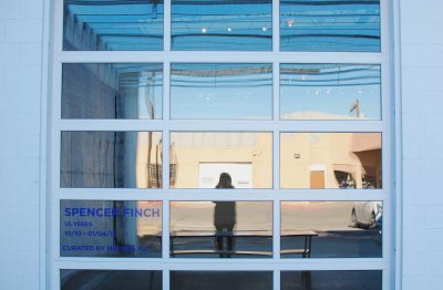 Martha Schnee '15 captures a self-portrait reflected in the facade of a Marfa art gallery.