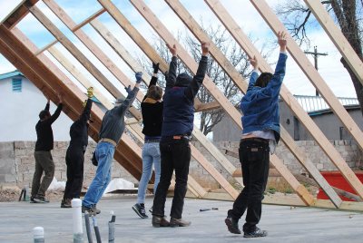 Carpenters put up a wall frame in Marfa, Texas. (Martha Schnee '15)