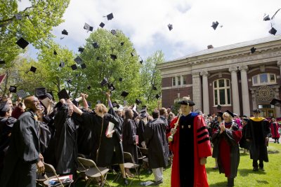 Students celebrate receiving their degrees last May. (Phyllis Graber Jensen/Bates College)