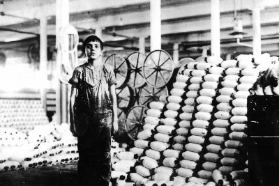 A child at an unknown textile mill in Lewiston, circa 1900. Courtesy University of Southern Maine, Franco-American Collection.