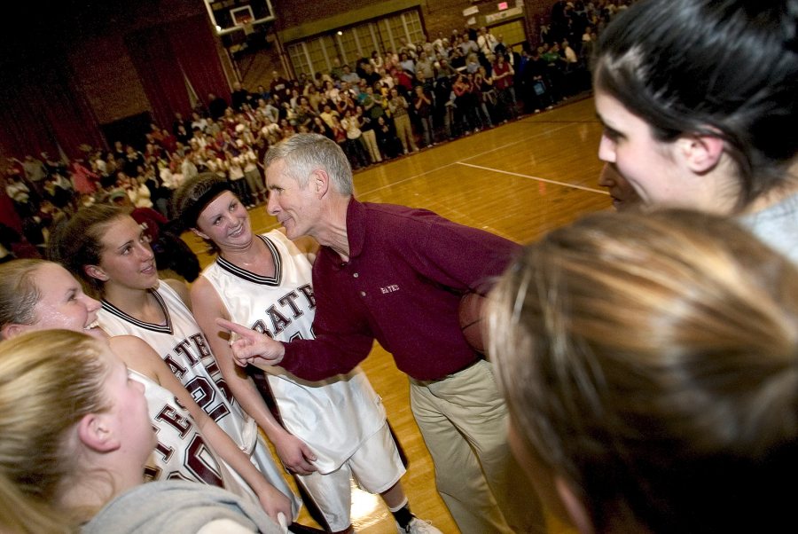 Jim Murphy congratulates his team after a win vs. Bowdoin on Feb. 11, 2005. The victor was Murphy's 200th career  victory, en route to 343 career victories. (Phyllis Graber Jensen/Bates College)