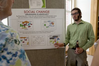 Charles Kenyon '15 of Buffalo, N.Y., discusses what he learned in the practitioner-taught course "Social Change," taught by Craig Saddlemire '05. (Phyllis Graber Jensen/Bates College)