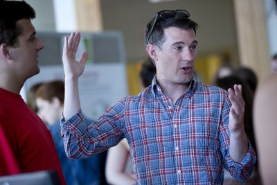 Mike Lydon '04, principal at The Street Plans Collaborative, led the "Practicum in Urban Planning," which included the creation of a bike lane in downtown Lewiston. (Phyllis Graber Jensen/Bates College)