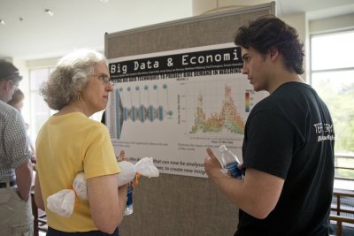 Sociologist Emily Kane, who played a central role in developing Bates' recent Short Term programming, listens as Tynan Daly '15 of Lake Forest, Ill., describes the "Big Data and Economics" course he took. (Phyllis Graber Jensen/Bates College)