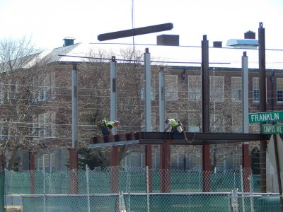 Erectors at work on April 22, 2015, the first day of hanging steel at the 65 Campus Ave. student residence. (Doug Hubley/Bates College)