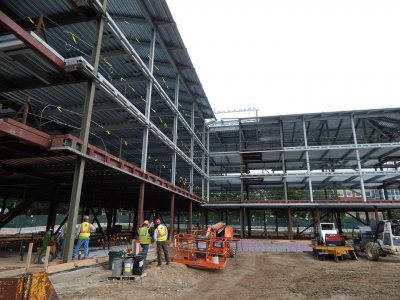 The new student residence at 65 Campus Ave., seen on June 3, 2015, from what will be a rain garden. (Doug Hubley/Bates College)