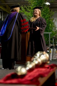 Caroline Caldwell of Gambier, Ohio, receives her bachelor of arts degree in environmental studies during Bates' 2015 Commencement. Caldwell was awarded a Watson Fellowship earlier this year. (Phyllis Graber Jensen/Bates College)