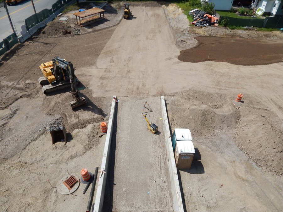 Taken July 28, 2015, this southward view from the fourth floor of 65 Campus Ave. shows the future loading dock for the College Store and Office Services, and the soon-to-be paved parking lot. (Doug Hubley/Bates College)