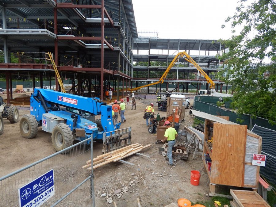 Getting to work at 65 Campus Ave. on June 12, 2015. (Doug Hubley/Bates College)