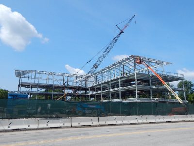 Erectors working for Stellar Steel mount roof supports on the 55 Campus Ave. student residence on July 6, 2015. (Doug Hubley/Bates College)