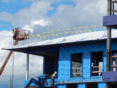 Weatherproof film on the roof of 65 Campus Ave. on Aug. 13, 2015. (Doug Hubley/Bates College)