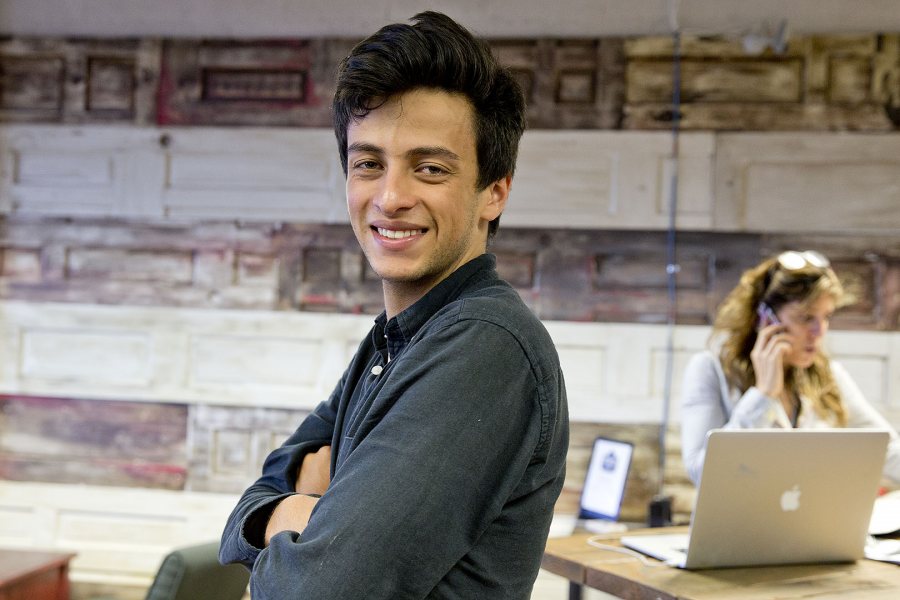Purposeful Work intern Joaquin Espinosa ’16 of Quito, Ecuador, poses at 1776, a global incubator and seed fund. Based in Washington, D.C., the firm helps startups in education, energy/sustainability, health, and transportation and smart cities. (Phyllis Graber Jensen/Bates College) 