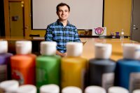 Jason DeFelice '17 of Salem, N.H., an intern with with Outright L/A, poses at the Lewiston Public Library prior to leading a Q-and-A with LGBT youth. (Phyllis Graber Jensen/Bates College) 