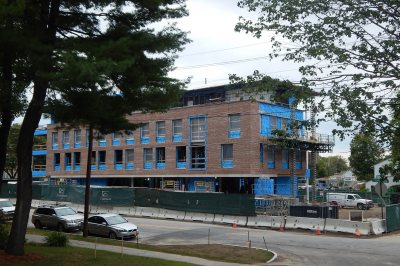 65 Campus Ave. is looking eminently bricky on an overcast Sept. 10, 2015. Notice the new sidewalk "bumpout" at bottom. (Doug Hubley/Bates College)