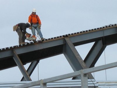 Workers building the new Commons roof on April 9, 2007. (Doug Hubley/Bates College)