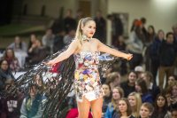 Elise Krims '16 hits the 2015 Trashion Show runway wearing Kevin Tejada's design "Phoenix Rising From the Ashes." Tejada said of his creation, "If Barbarella and Madonna had a child, this would be her." (Josh Kuckens/Bates College)