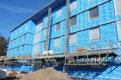 Maine Masonry was starting on the south wall of 55 Campus Ave. on Dec. 1, 2015. (Doug Hubley/Bates College)