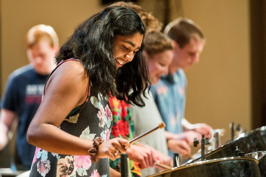 Zofia Ahmad '19 of Palo Alto, Calif., and bandmates perform an encore during a Bates Steel Pan Orchestra concert in December 2015. The orchestra makes its Arts Crawl debut on Jan. 28. (Josh Kuckens/Bates College)