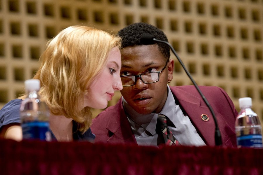 Zoe Seaman-Grant '17 of the Brooks Quimby Debate Council and Jonathan Carlisle, Morehouse College Class of 2017, are shown during the 2015 Rev. Benjamin Elijah Mays debate on Martin Luther King Jr. Day. (Phyllis Graber Jensen/Bates College)